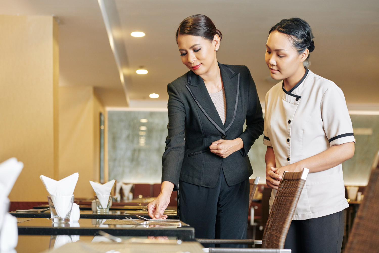 A manager giving guidance to a staff