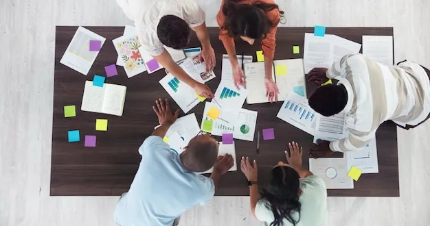 Team samarbeider om dokumenter i et møte