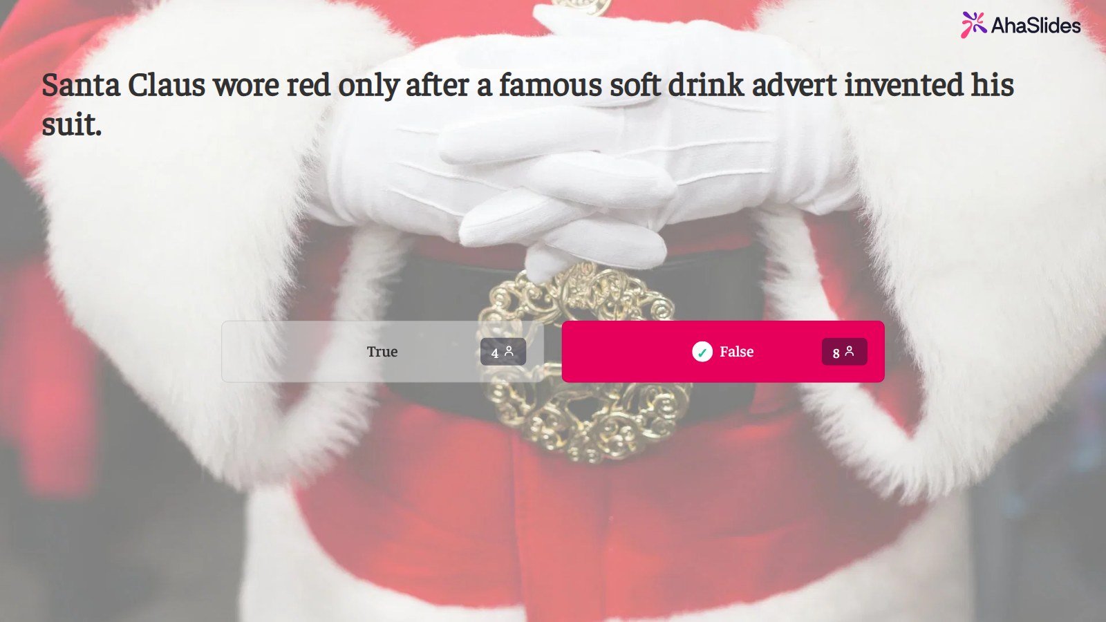 AhaSlides True or False slide over a photo of a Santa suit for the claim that Santa wore red only after a soft drink advert, with False marked correct and 8 votes for False and 4 for True