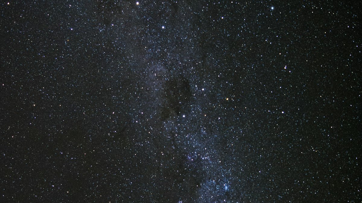 The Milky Way crossing a dark star-filled night sky