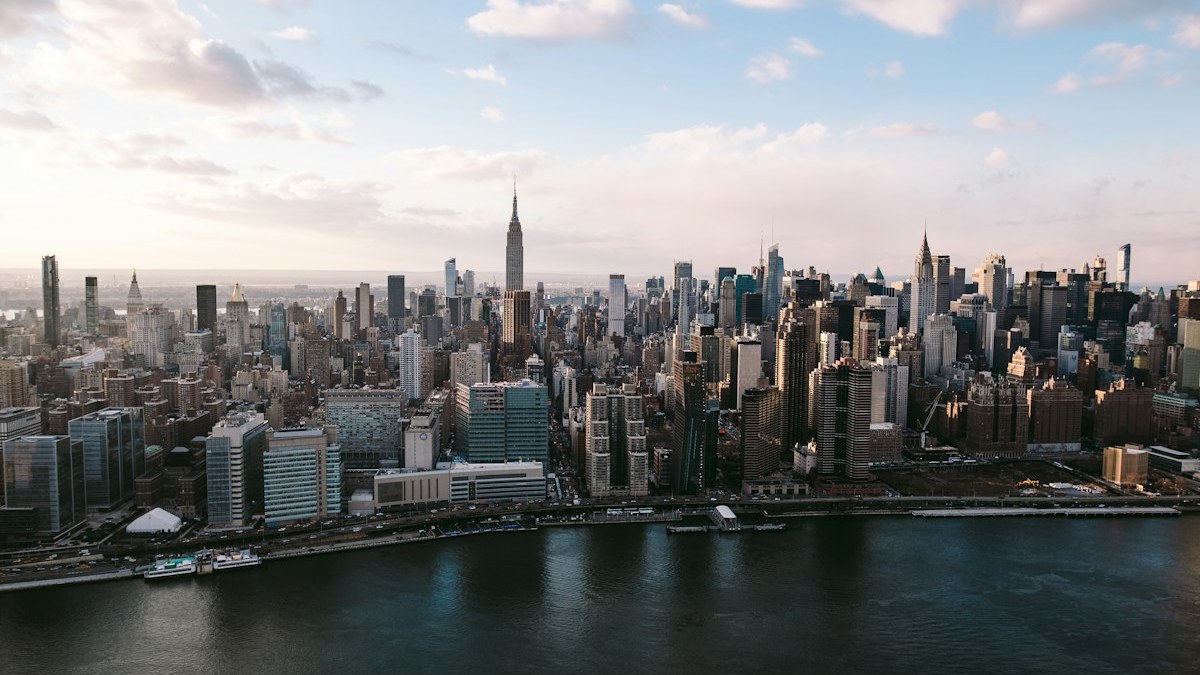 The Manhattan skyline seen from above the East River at dusk