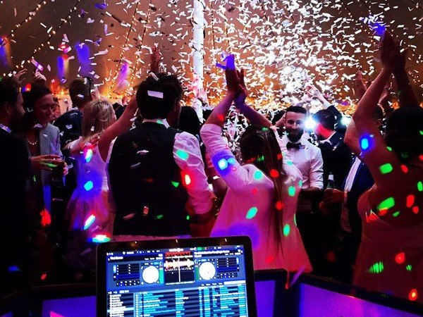 Hire a DJ is a fun way to entertain your guests at the wedding reception