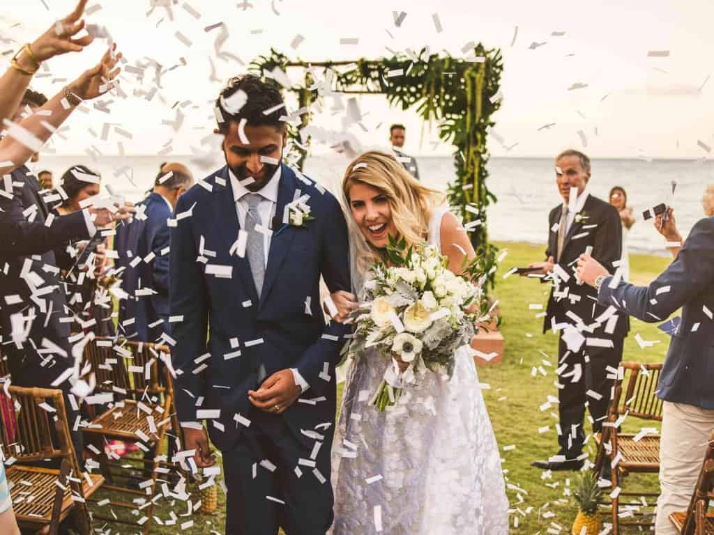 Walking between rows of confetti is another great idea for your wedding reception